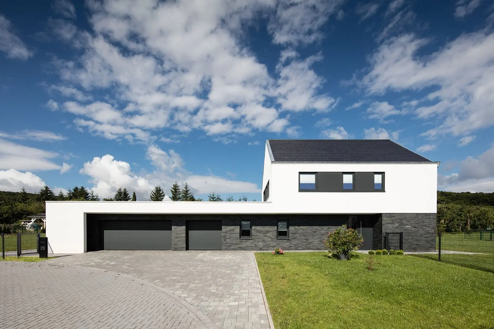 Neubau modernes Einfamilienhaus mit Natursteinsockel (Schiefer) in Haynrode, Eichsfeld, Architekt Michael Flagmeyer